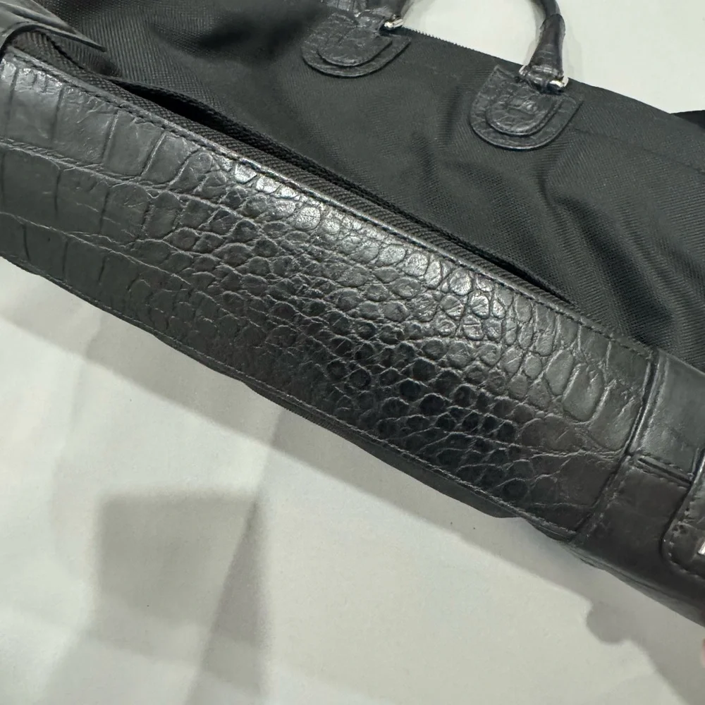 Tumi Travel Black Briefcase with Leather Finish and Metal Accents